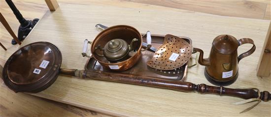 A Victorian copper warming pan, a cream skimmer and three other pieces (5)